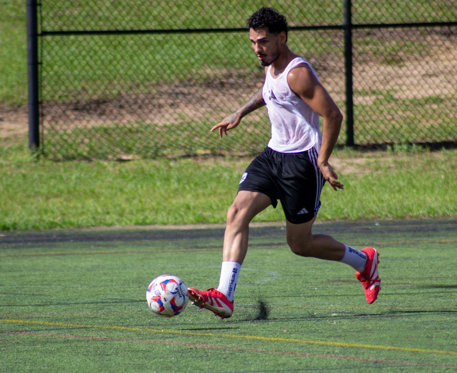 Player sprinting with the ball